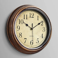 Olvoria | Reloj de pared clásico con números romanos