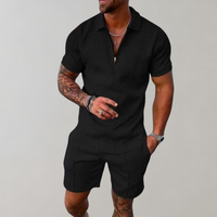 Olvoria | Conjunto de polo con cremallera y pantalones cortos para hombre con patrón geométrico