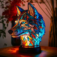 Lámpara escultórica de vidrio con motivos animales en luz sutil