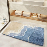 Alfombrilla de baño con patrón de huellas marinas